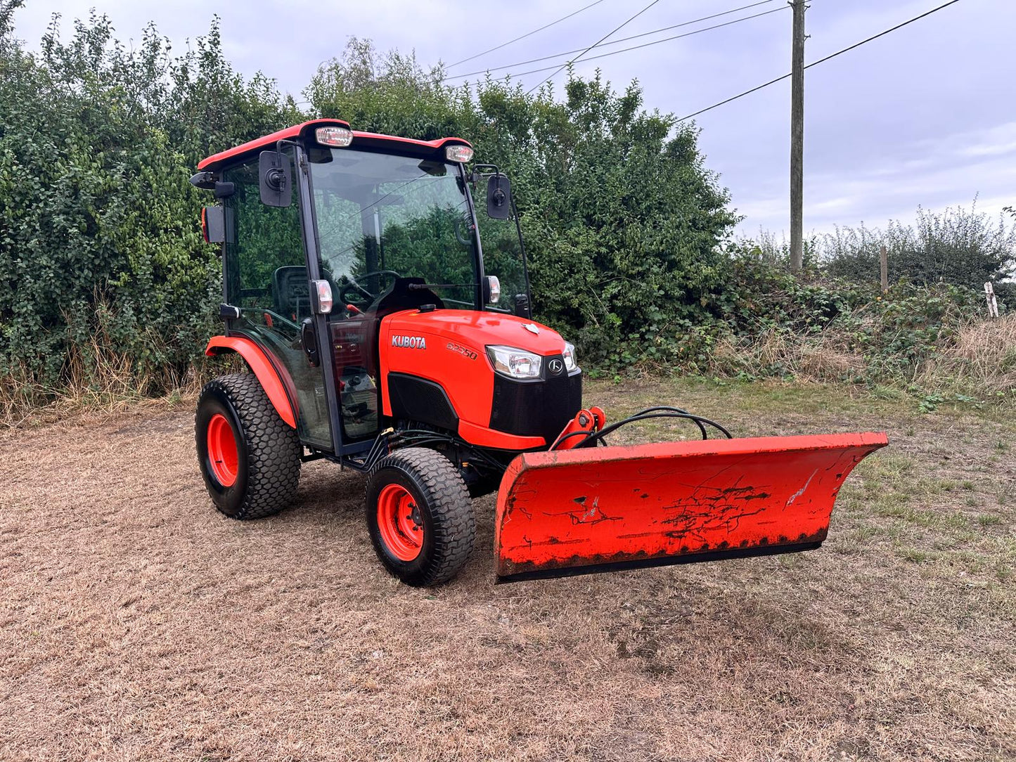 65 REG. KUBOTA B2350 23HP 4WD COMPACT TRACTOR WITH HYDRAULIC 4 WAY BLADE