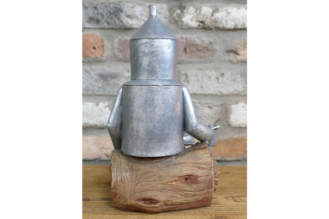 Tin Man Sat On A Log