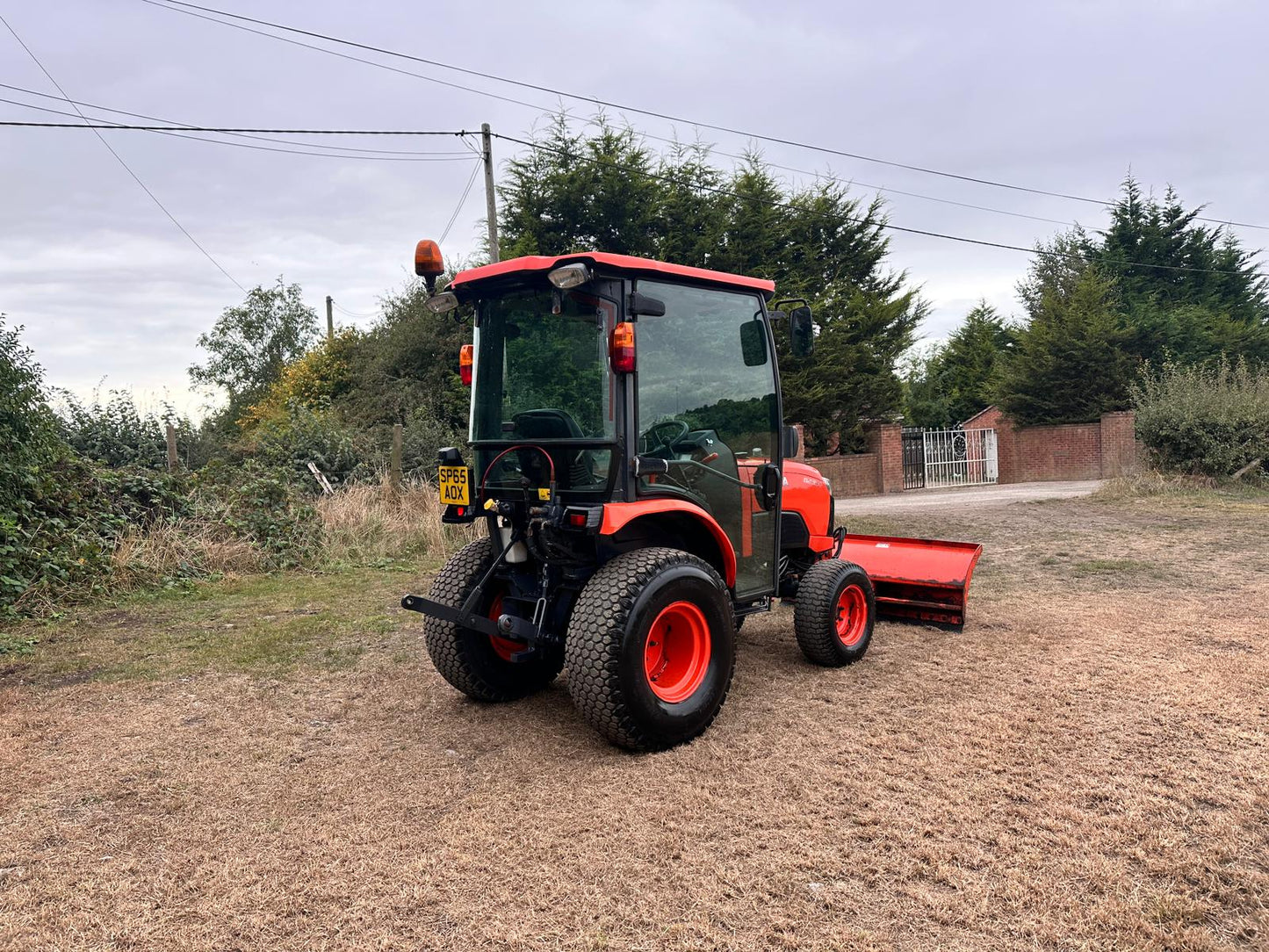 65 REG. KUBOTA B2350 23HP 4WD COMPACT TRACTOR WITH HYDRAULIC 4 WAY BLADE