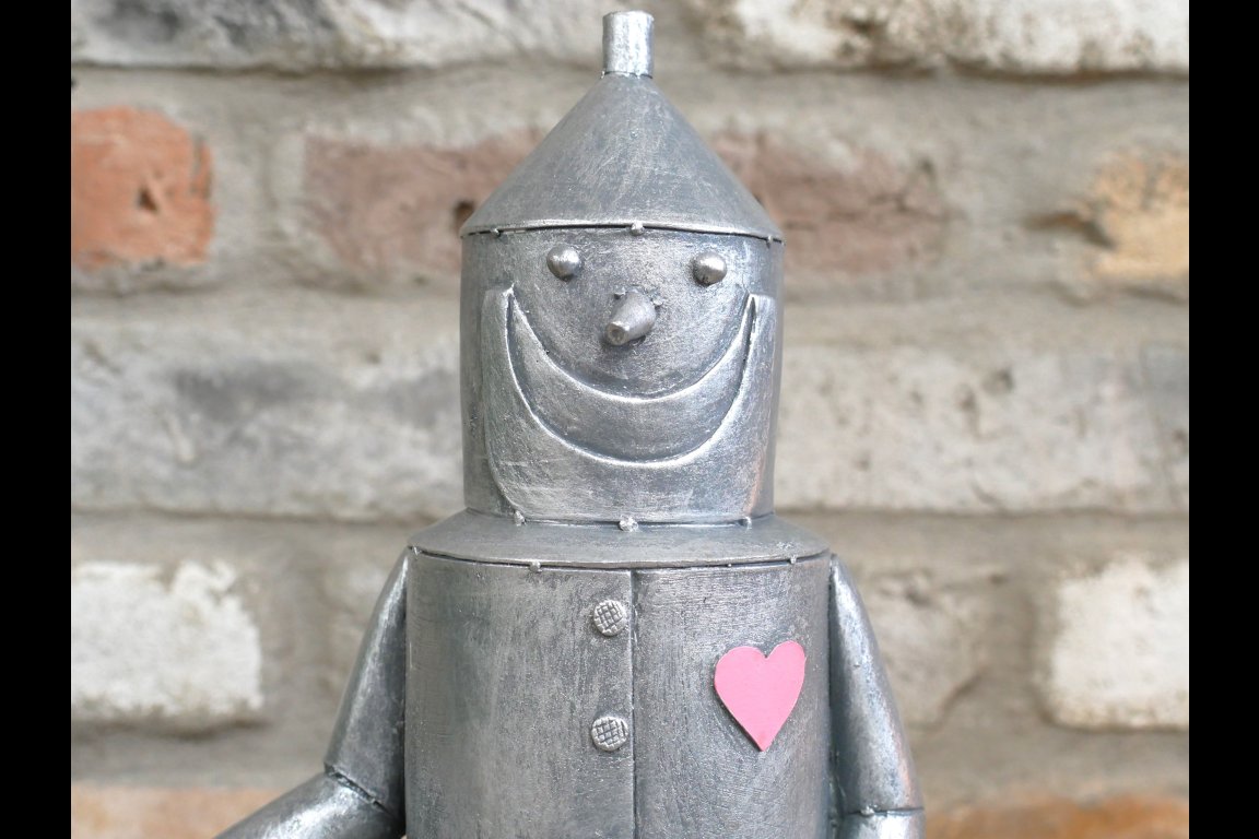 Tin Man Sat On A Log