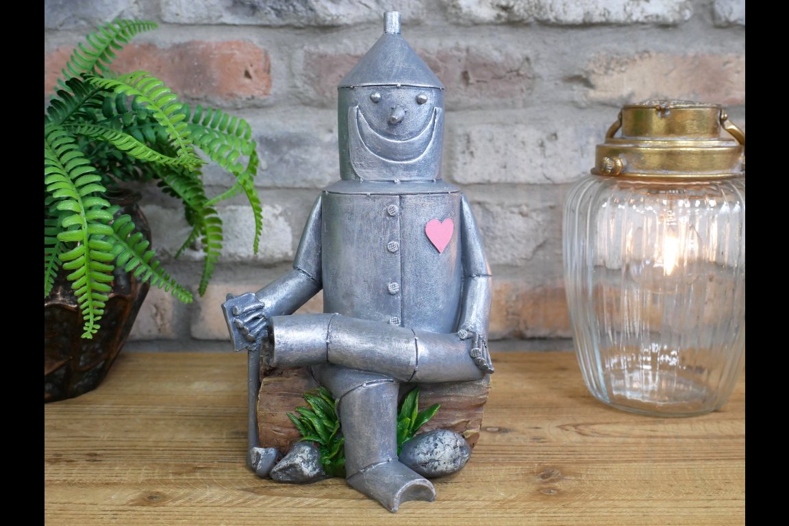 Tin Man Sat On A Log