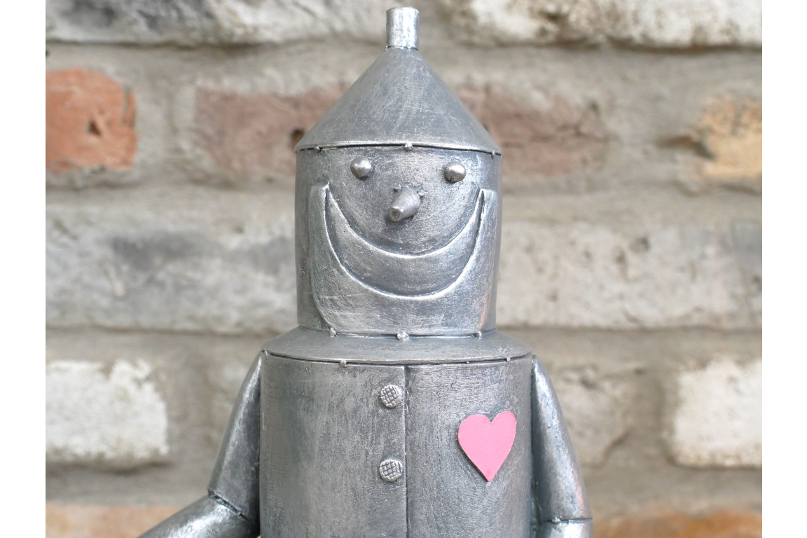 Tin Man Sat On A Log