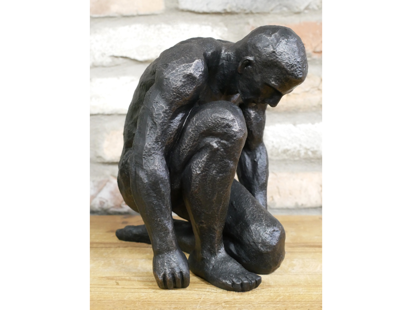 Kneeling Man