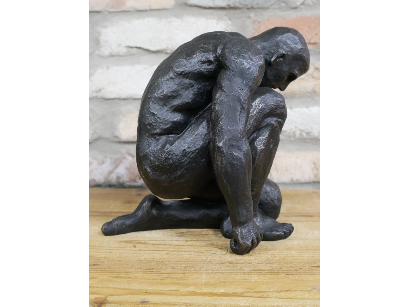 Kneeling Man