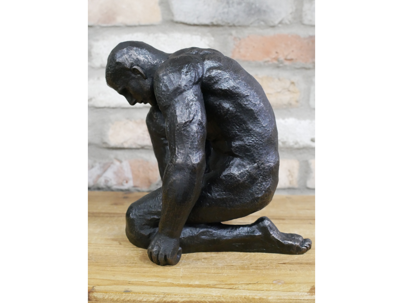 Kneeling Man