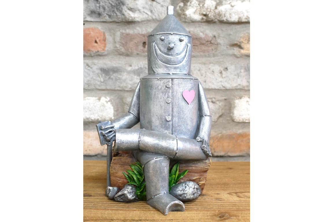 Tin Man Sat On A Log