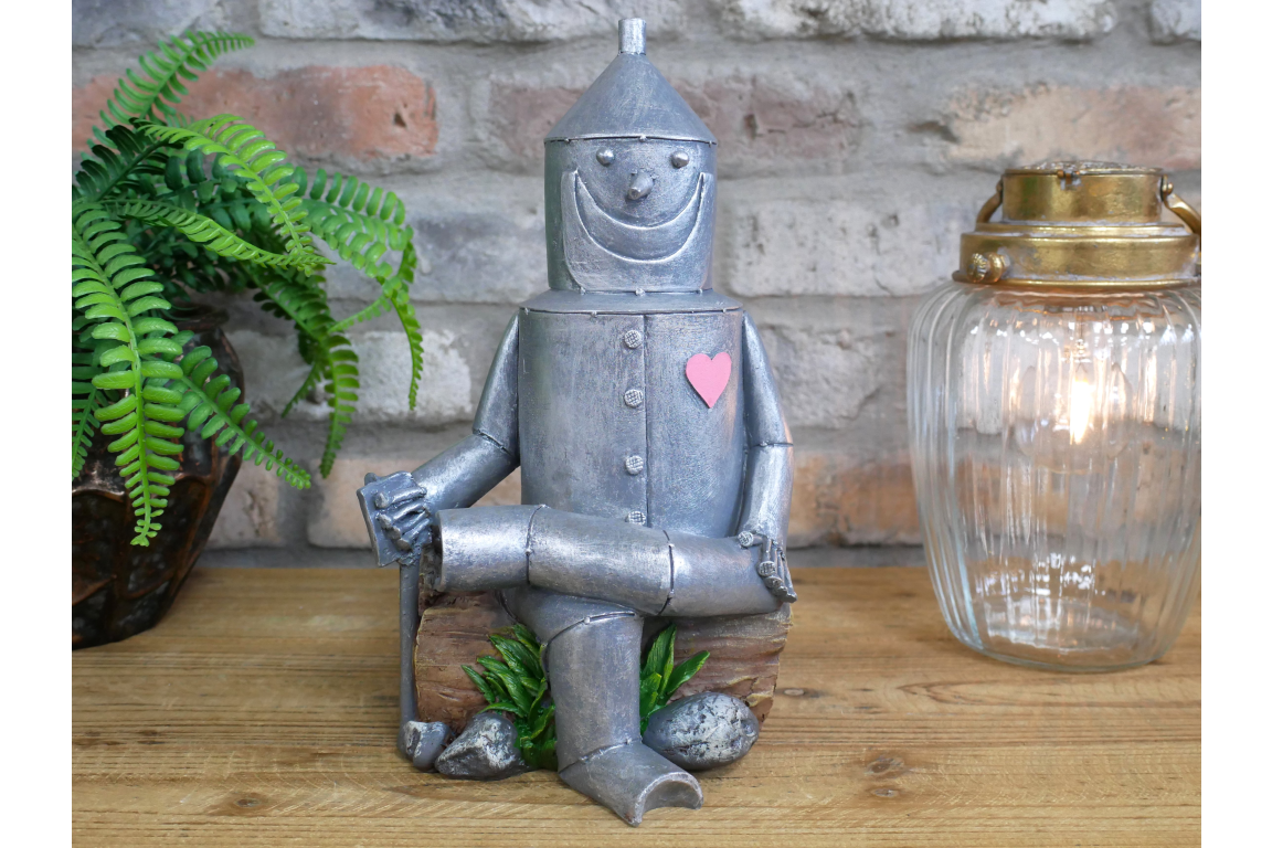 Tin Man Sat On A Log