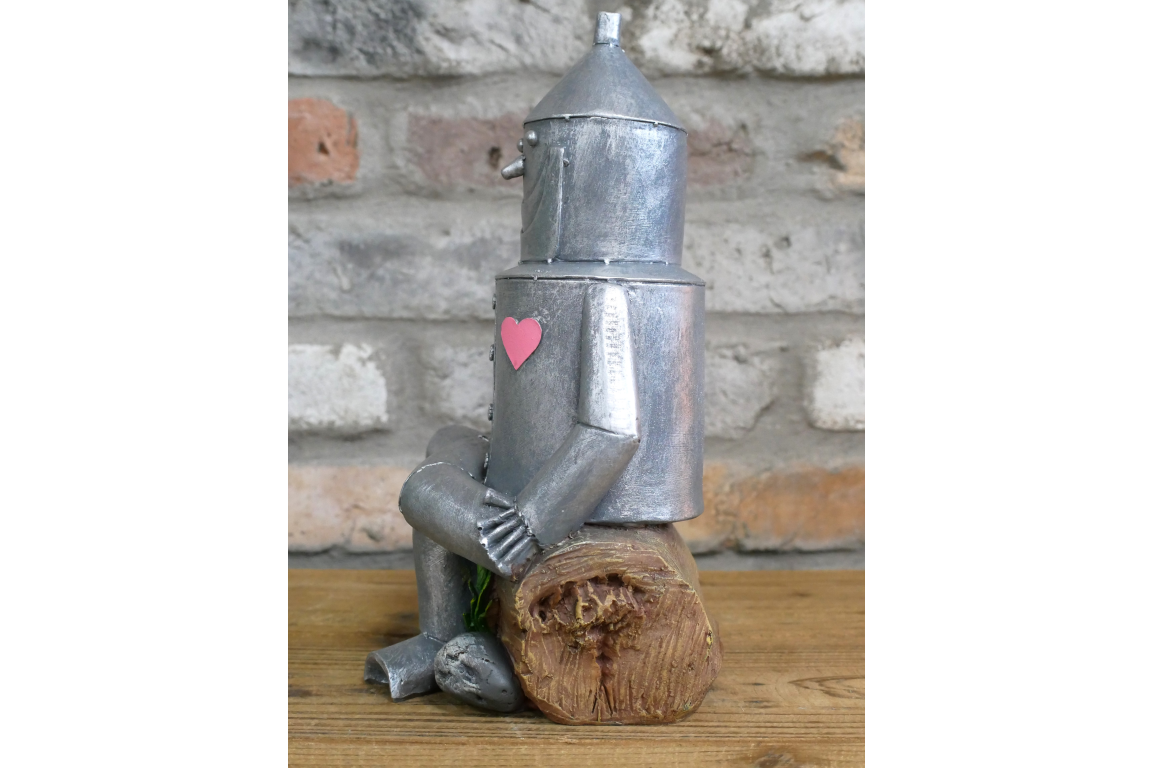 Tin Man Sat On A Log