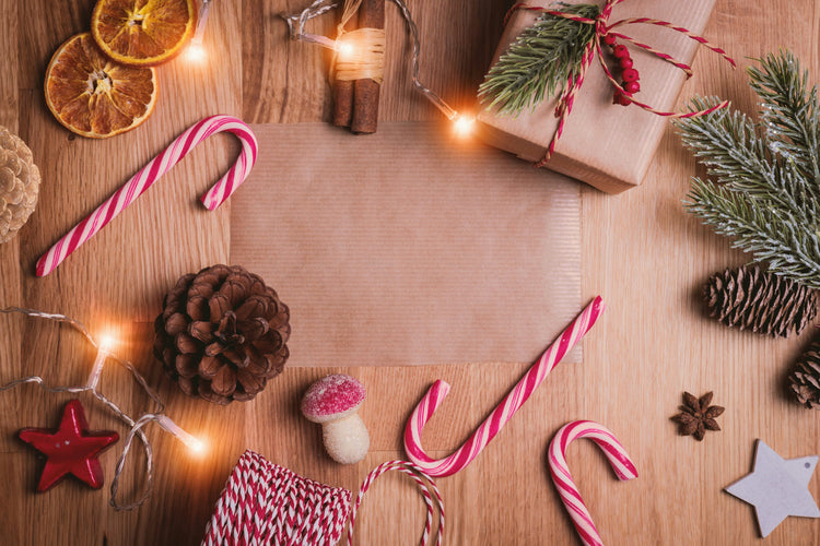 Candy canes and Christmas accessories on a table