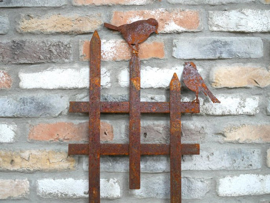 Rusty Fence With Birds Stake