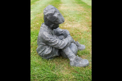 Boy Sat With Football