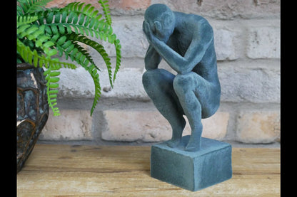 Man With Head In Hands