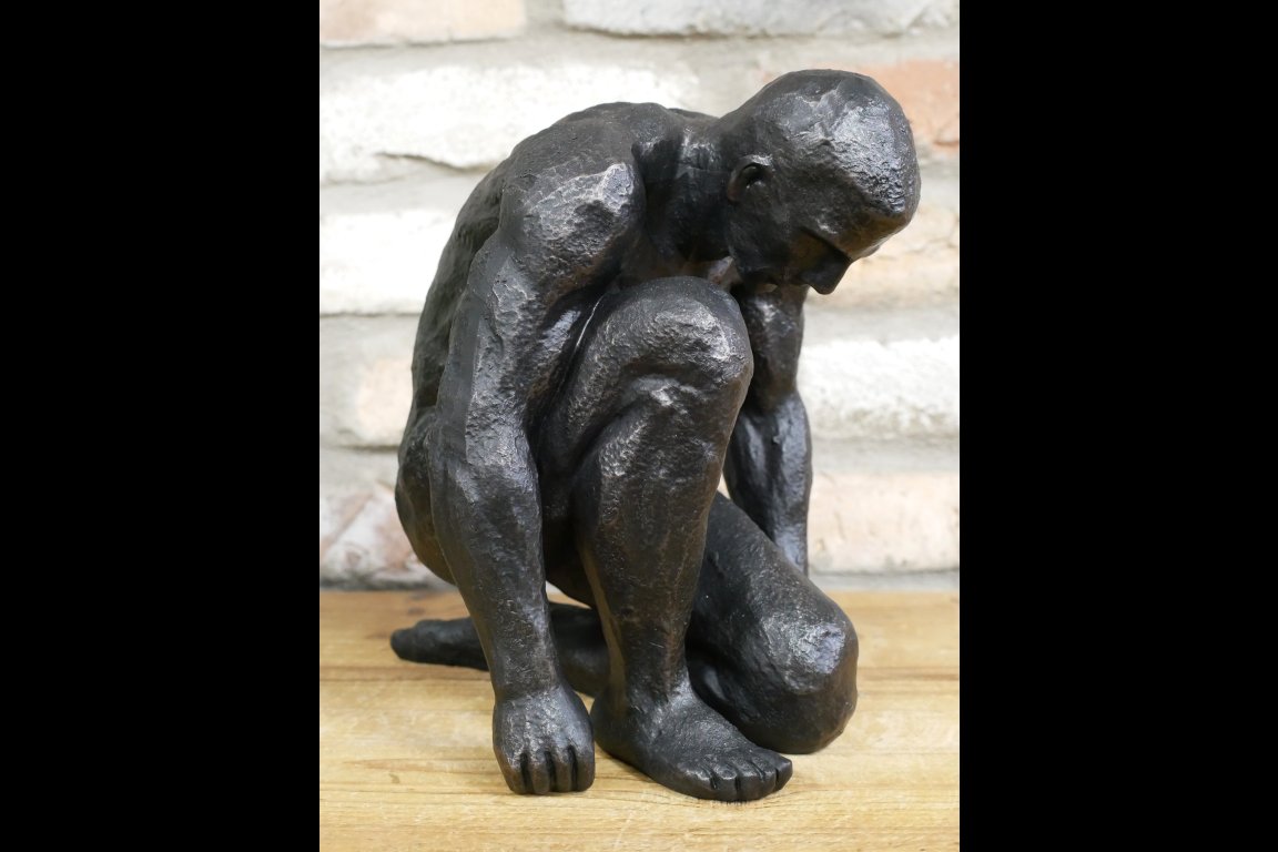 Kneeling Man