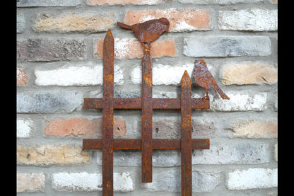 Rusty Fence With Birds Stake