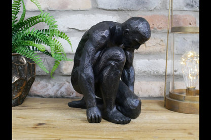 Kneeling Man