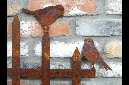 Rusty Fence With Birds Stake