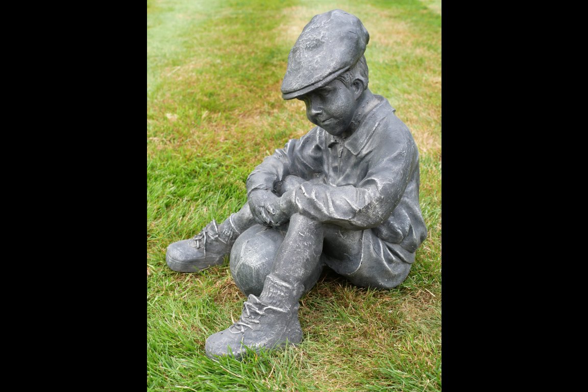Boy Sat With Football