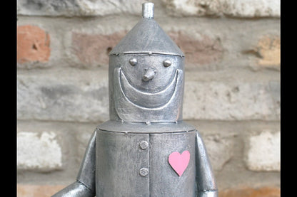 Tin Man Sat On A Log