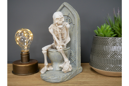 Skeleton On The Loo