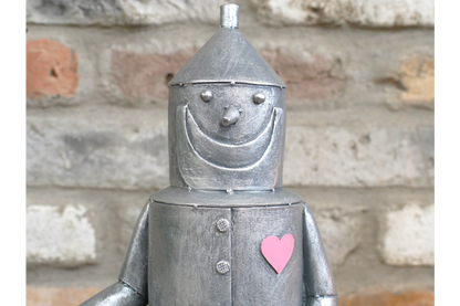Tin Man Sat On A Log