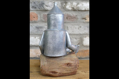 Tin Man Sat On A Log