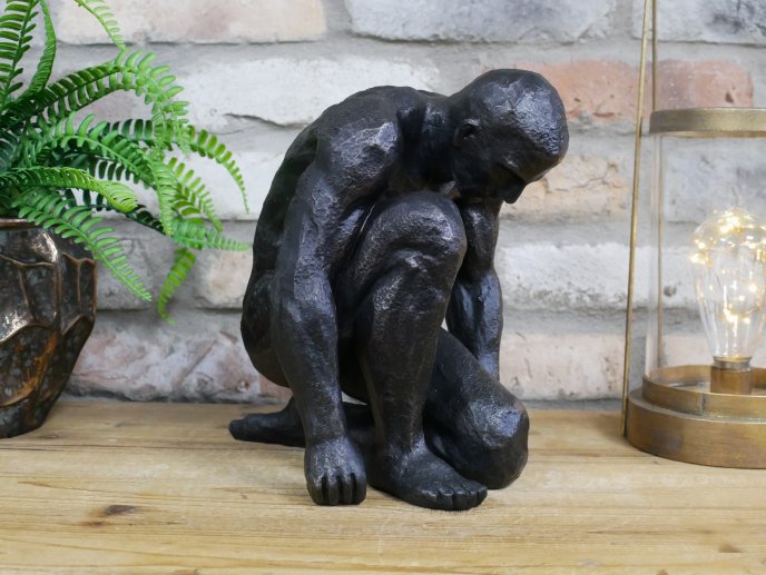 Kneeling Man