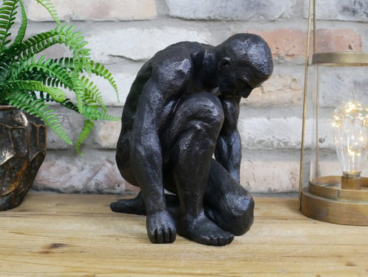 Kneeling Man