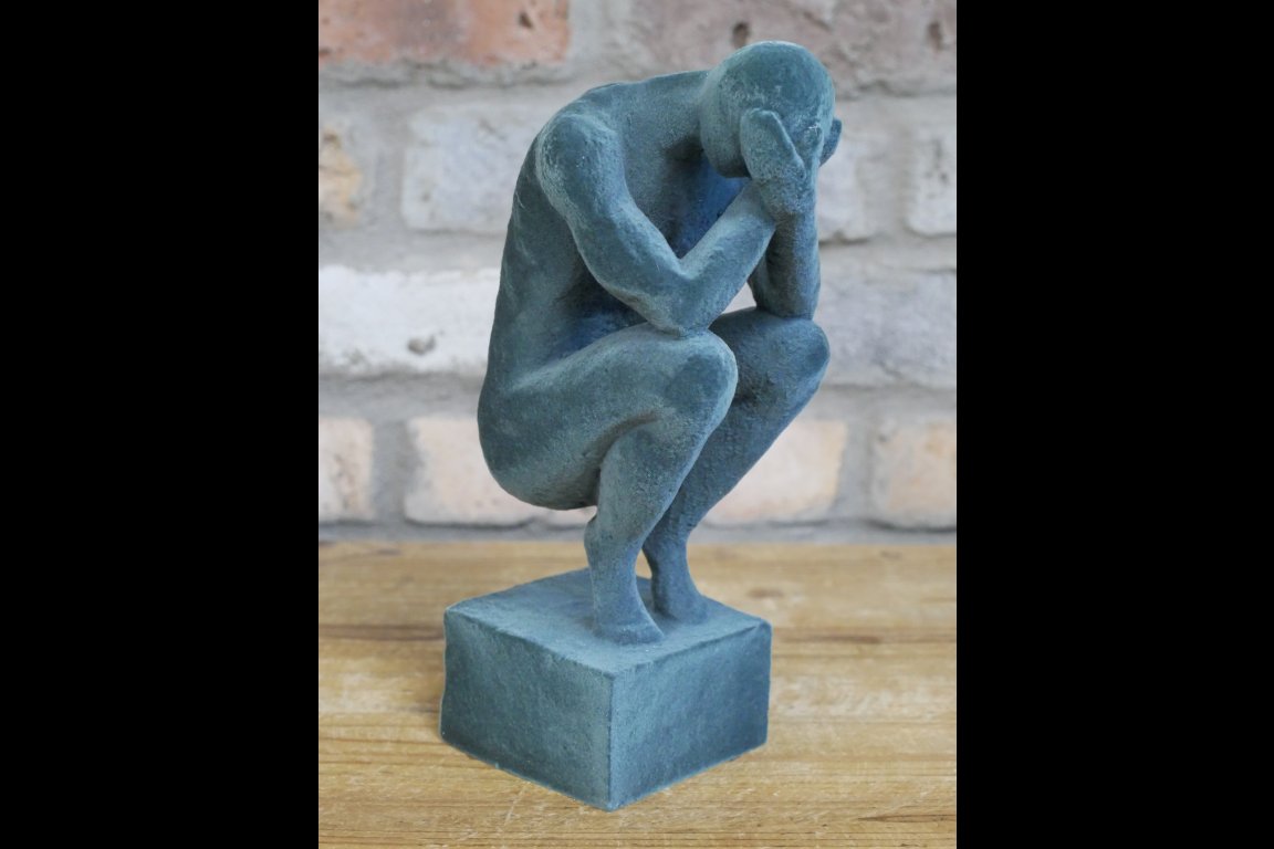 Man With Head In Hands