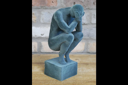 Man With Head In Hands