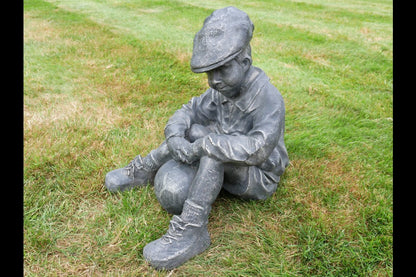 Boy Sat With Football