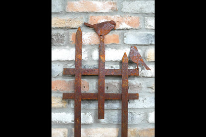 Rusty Fence With Birds Stake