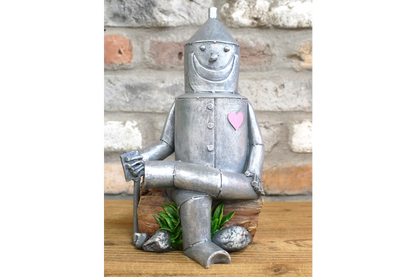 Tin Man Sat On A Log
