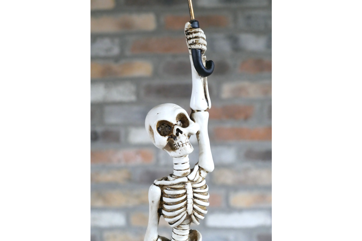Skeleton With Flying Umbrella