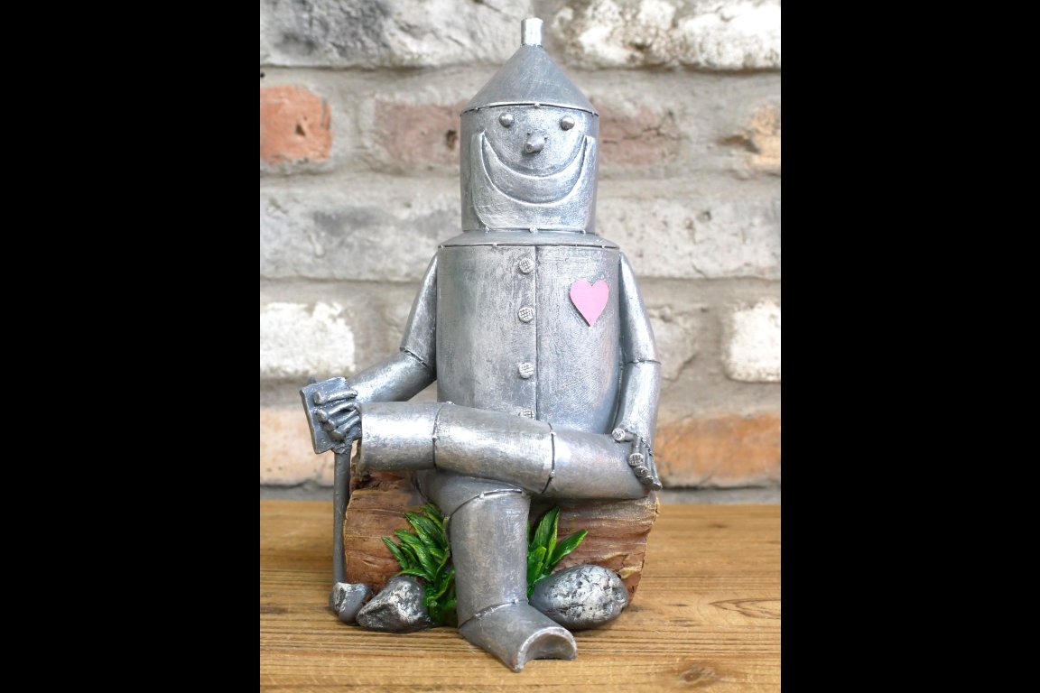 Tin Man Sat On A Log