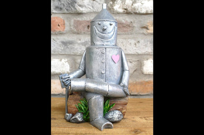 Tin Man Sat On A Log