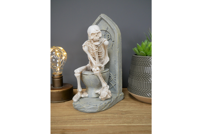 Skeleton On The Loo