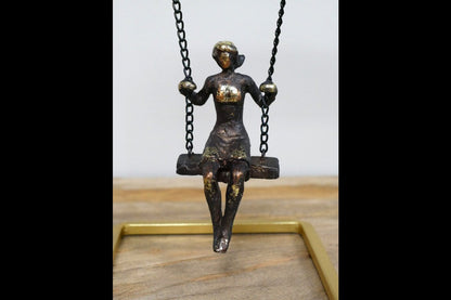 Girl On Swing