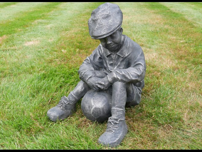 Boy Sat With Football