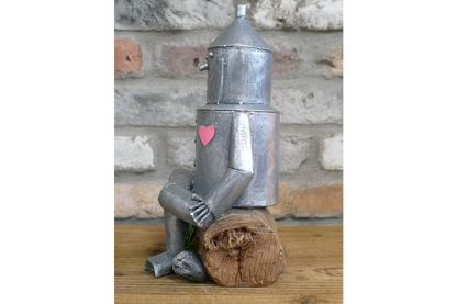 Tin Man Sat On A Log