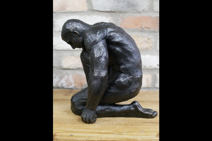 Kneeling Man