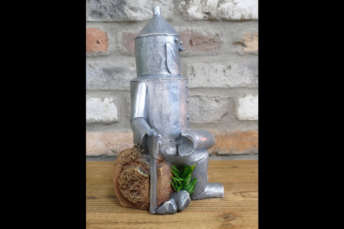 Tin Man Sat On A Log