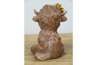 Sitting Highland Cow